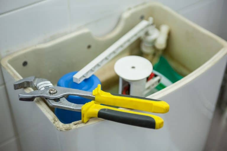 How To Remove A Stuck Plastic Lock Nut From A Toilet Tank Mr. Kitchen