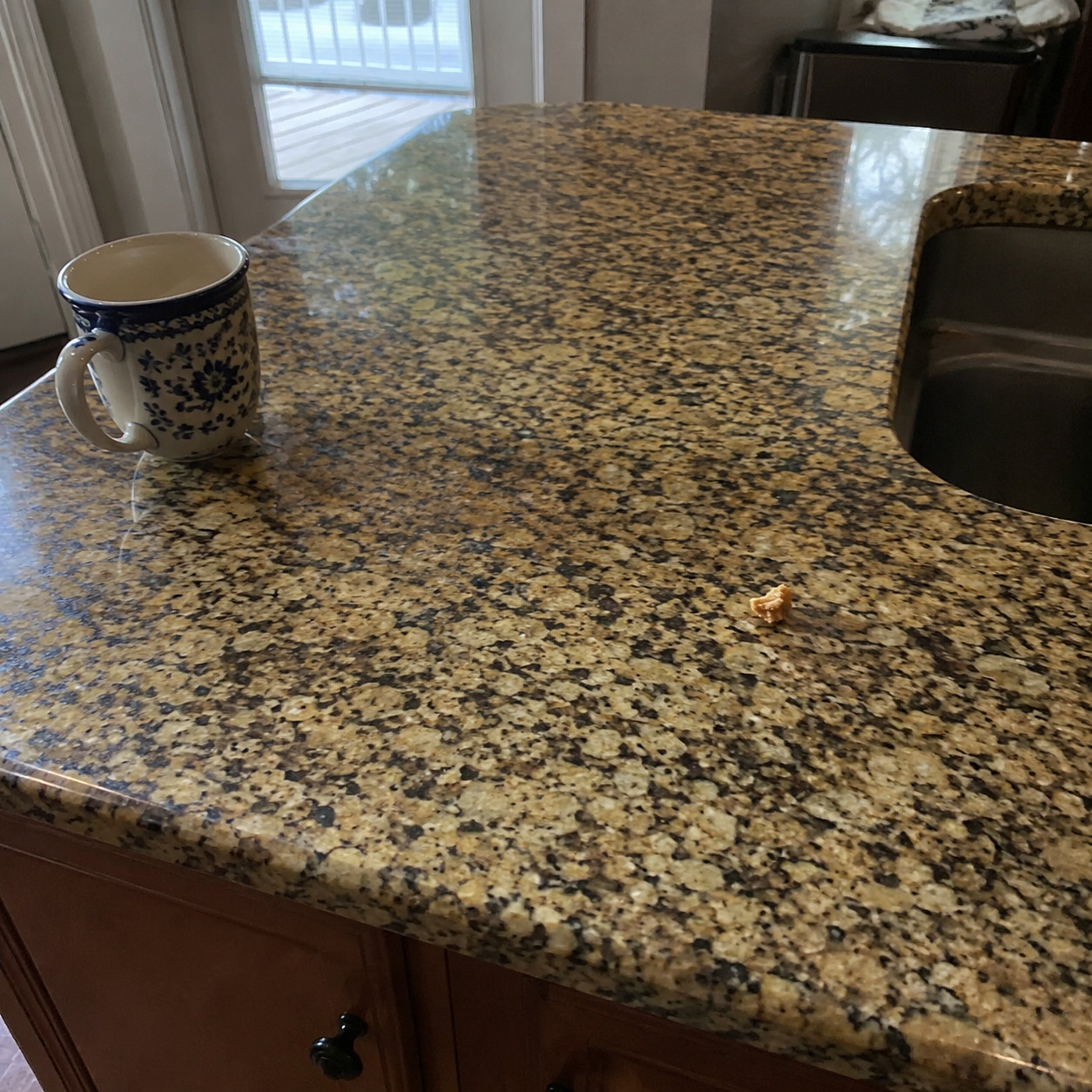 Busy gold-and-brown speckled granite