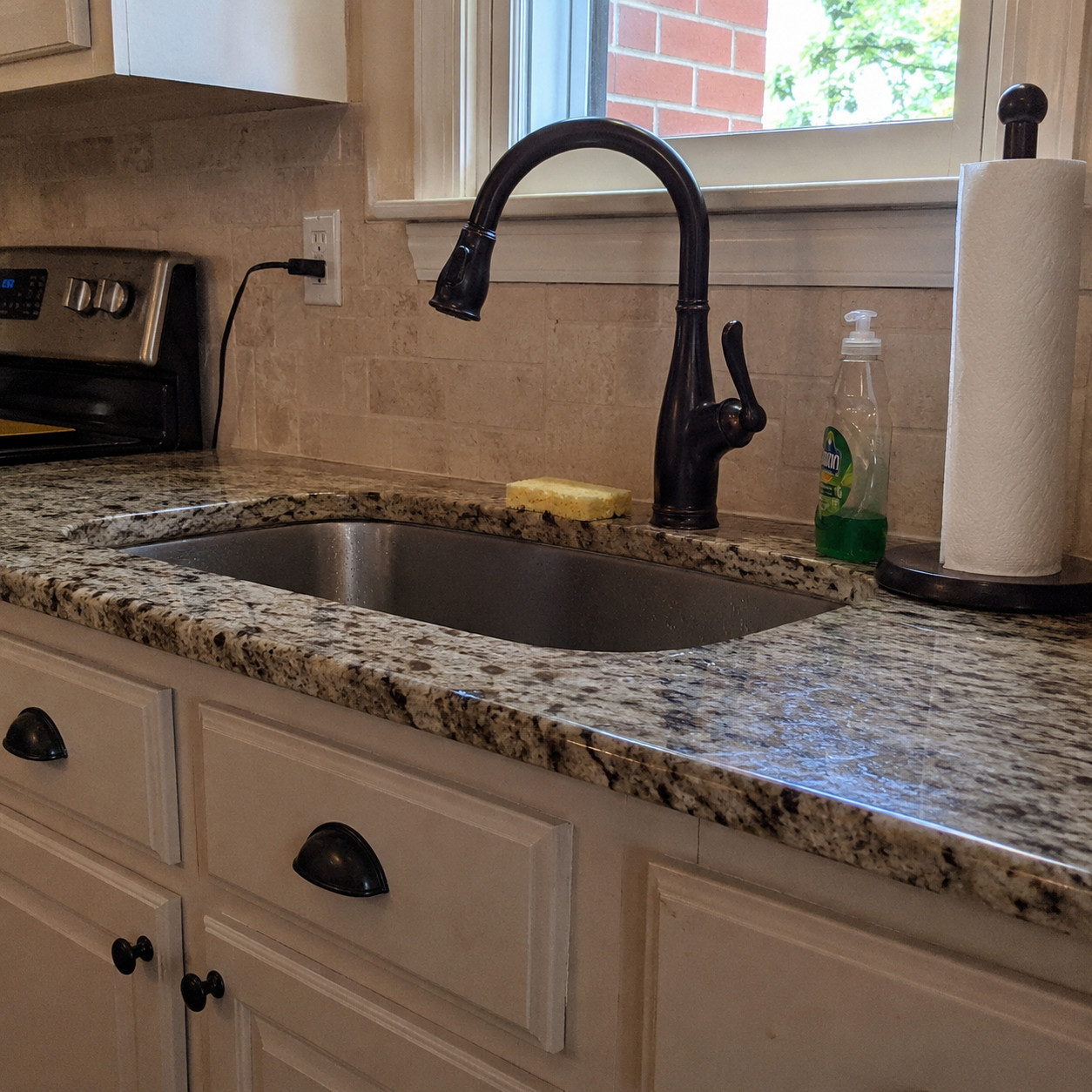Oil-rubbed bronze hardware and faucet