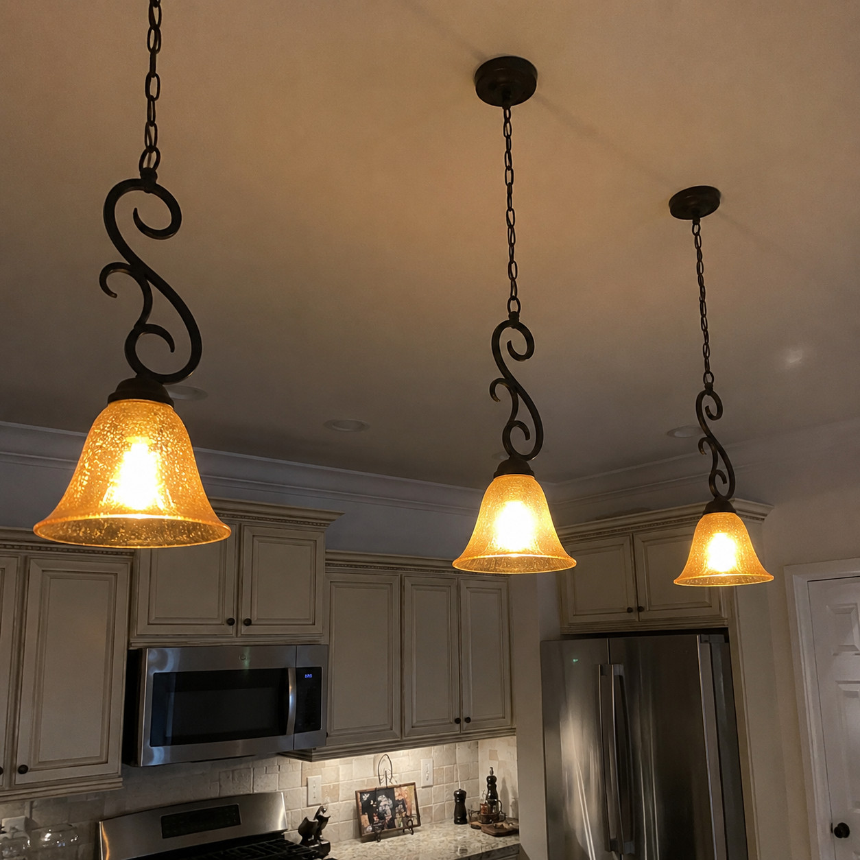 Scrolled 'Tuscan' pendant lights