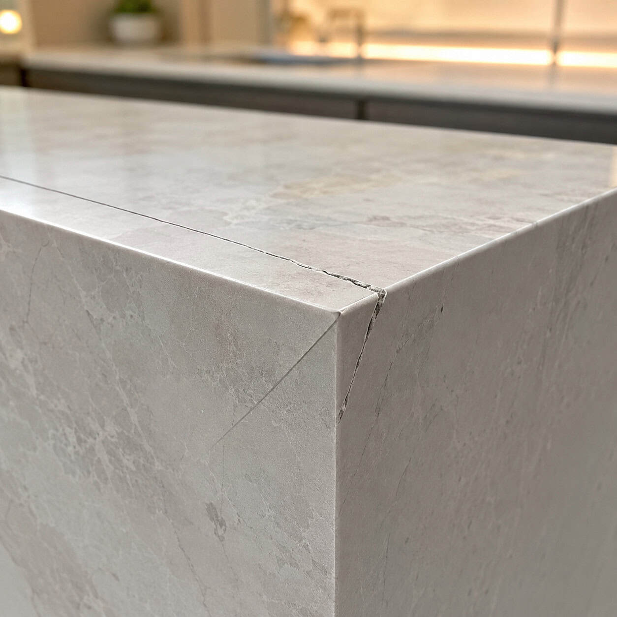 Mitered, chunky waterfall-thick counter edges