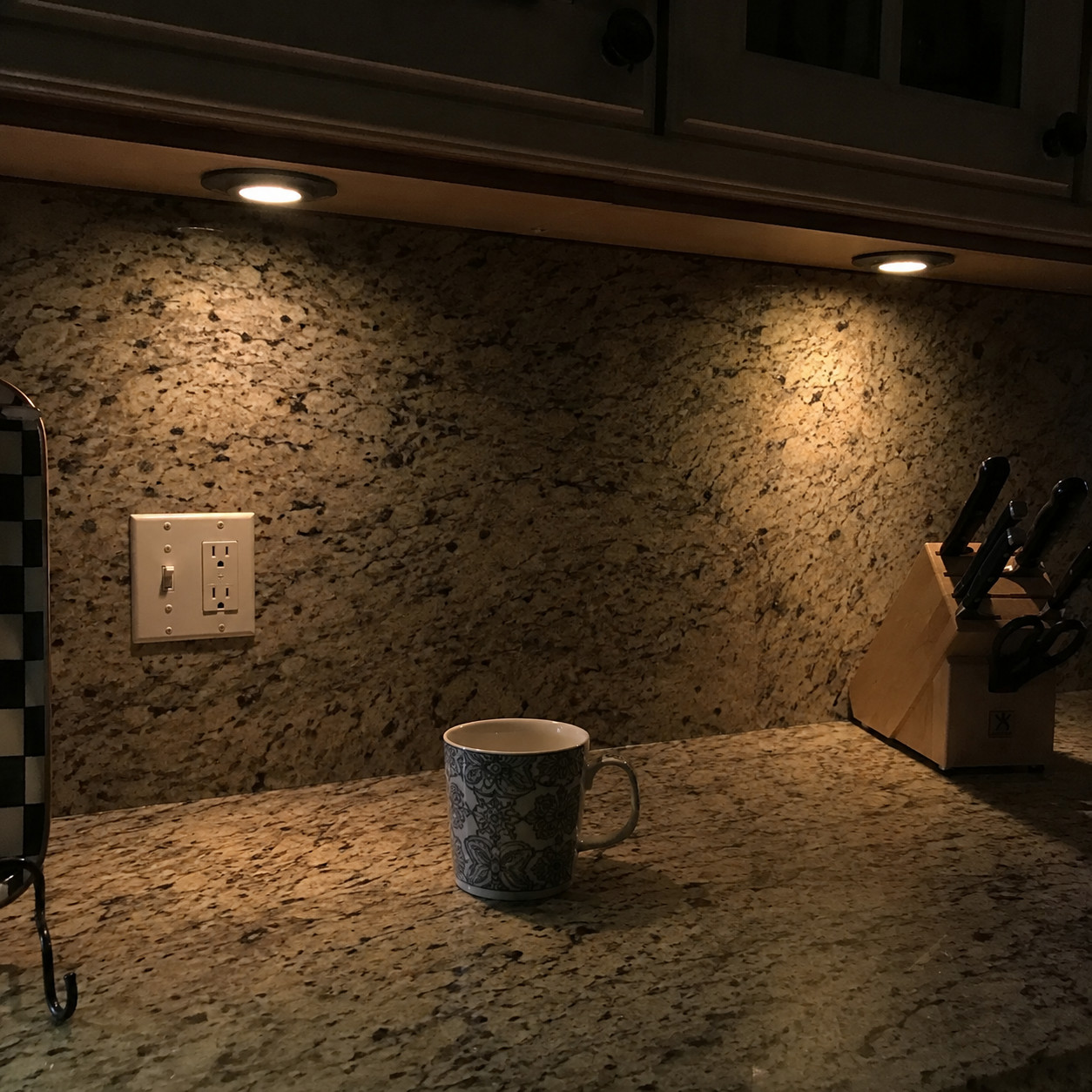 Yellowy under-cabinet puck lighting
