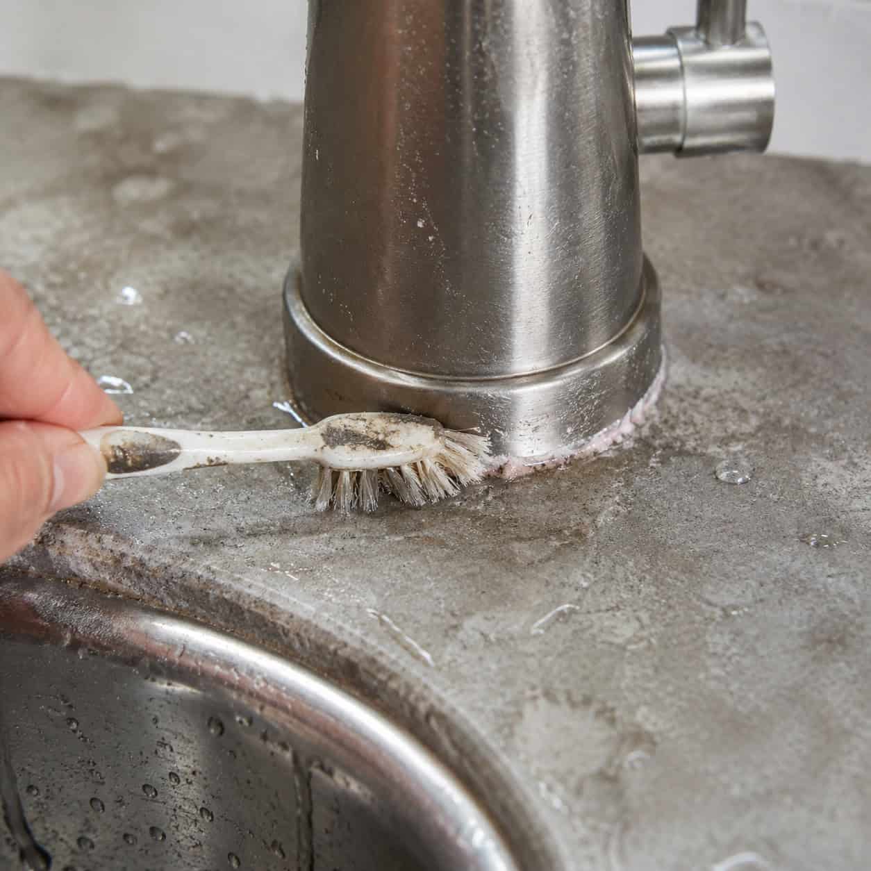 A Worn-Out Toothbrush for the Base of the Faucet