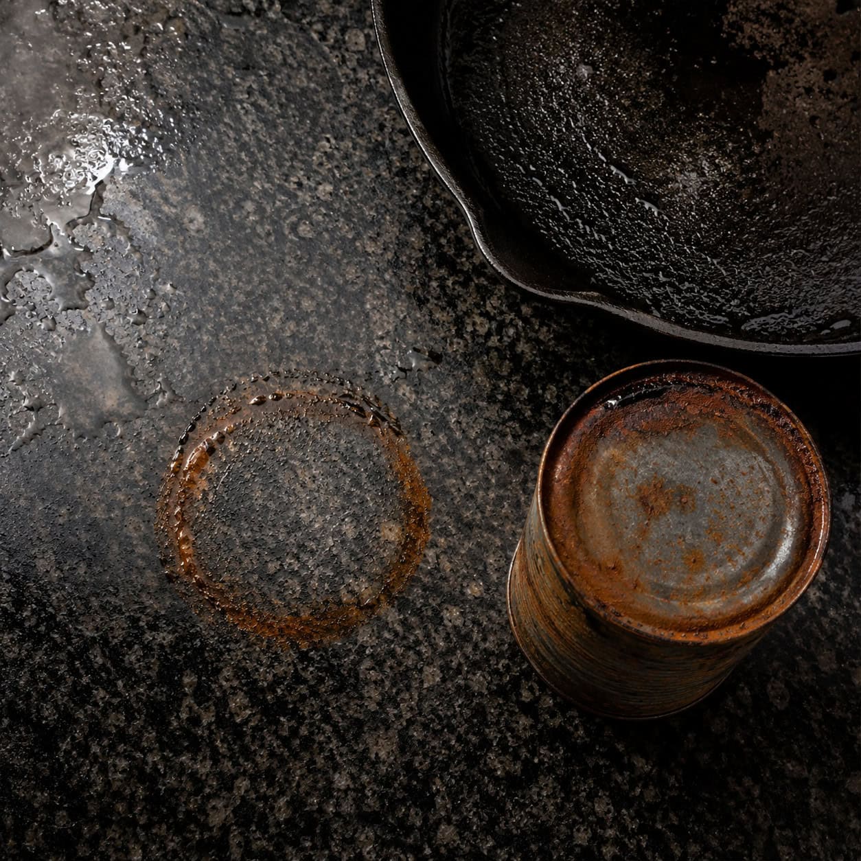Using the counter as a landing pad for a rusting can or cast-iron pan