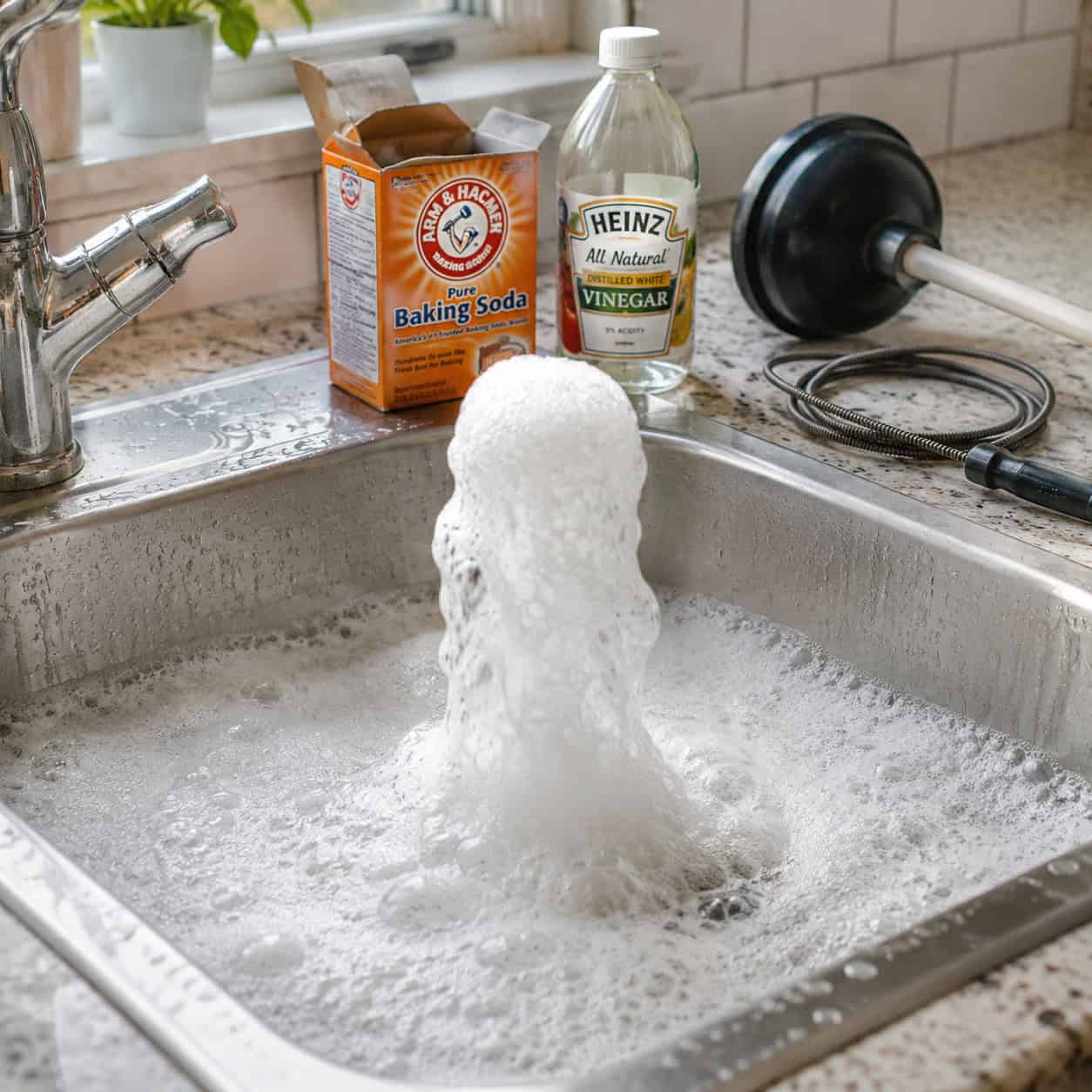 The Baking Soda and Vinegar Volcano Down the Drain