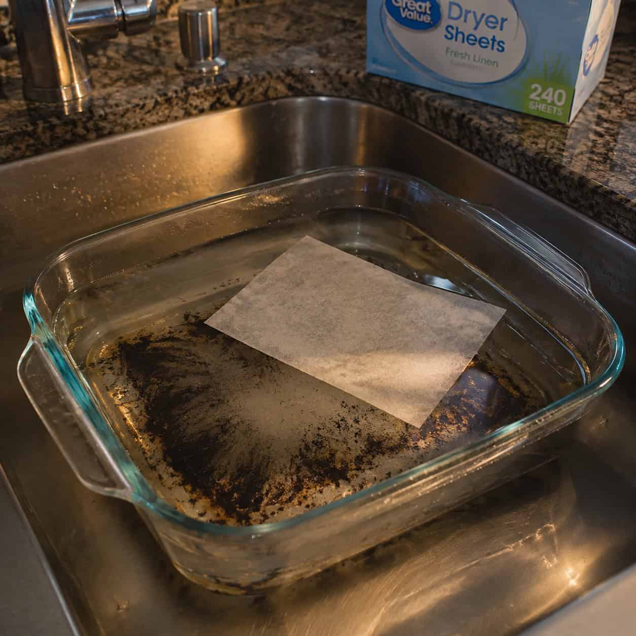 A Dryer Sheet Left Soaking in the Baked-On Casserole Dish