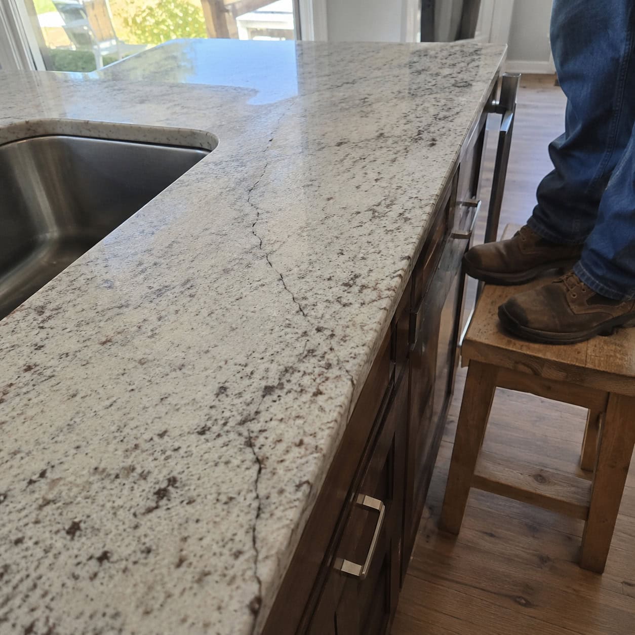 Using the counter as a step stool — or a seat