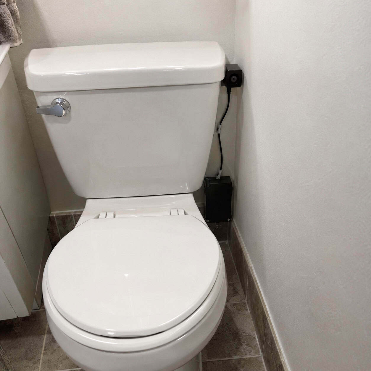 The Auto-Flush Residential Toilet