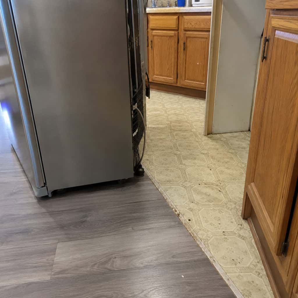 Flooring that stops where the fridge starts