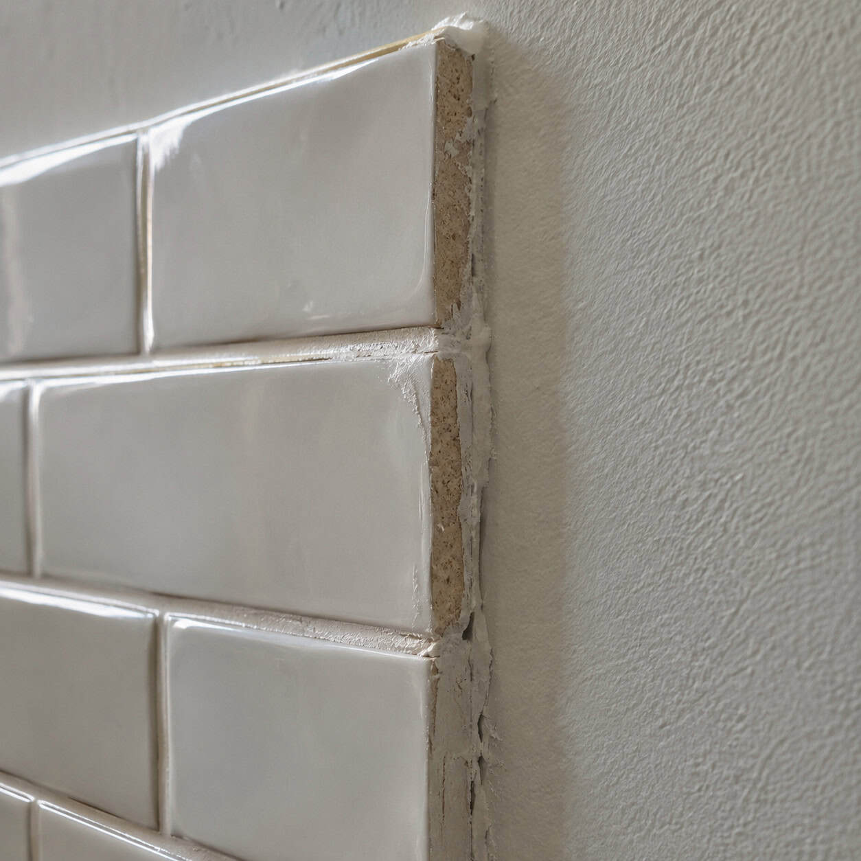 A backsplash that ends in a raw tile edge