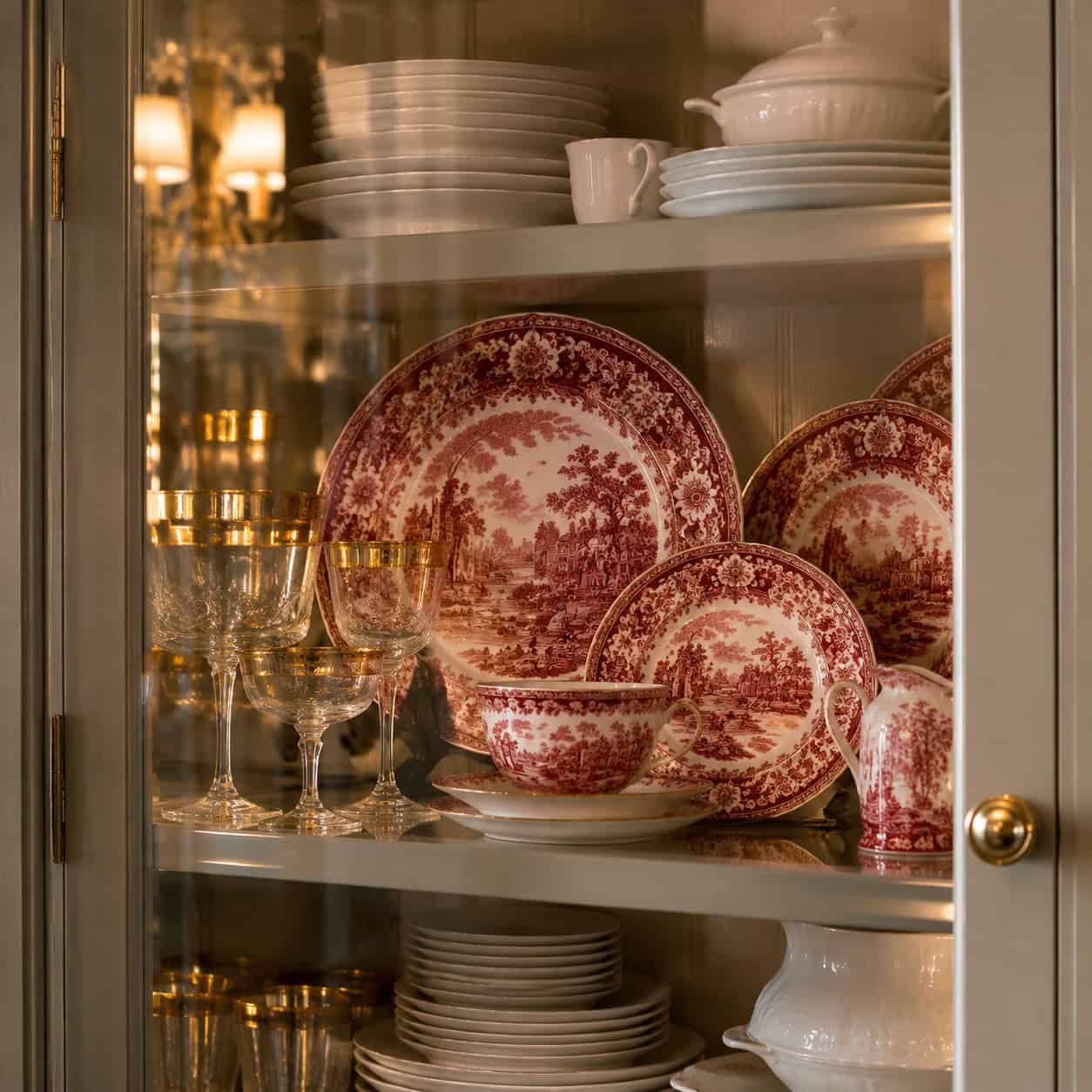 Holiday Dishes Pulled to the Front of the Glass-Front Cabinet