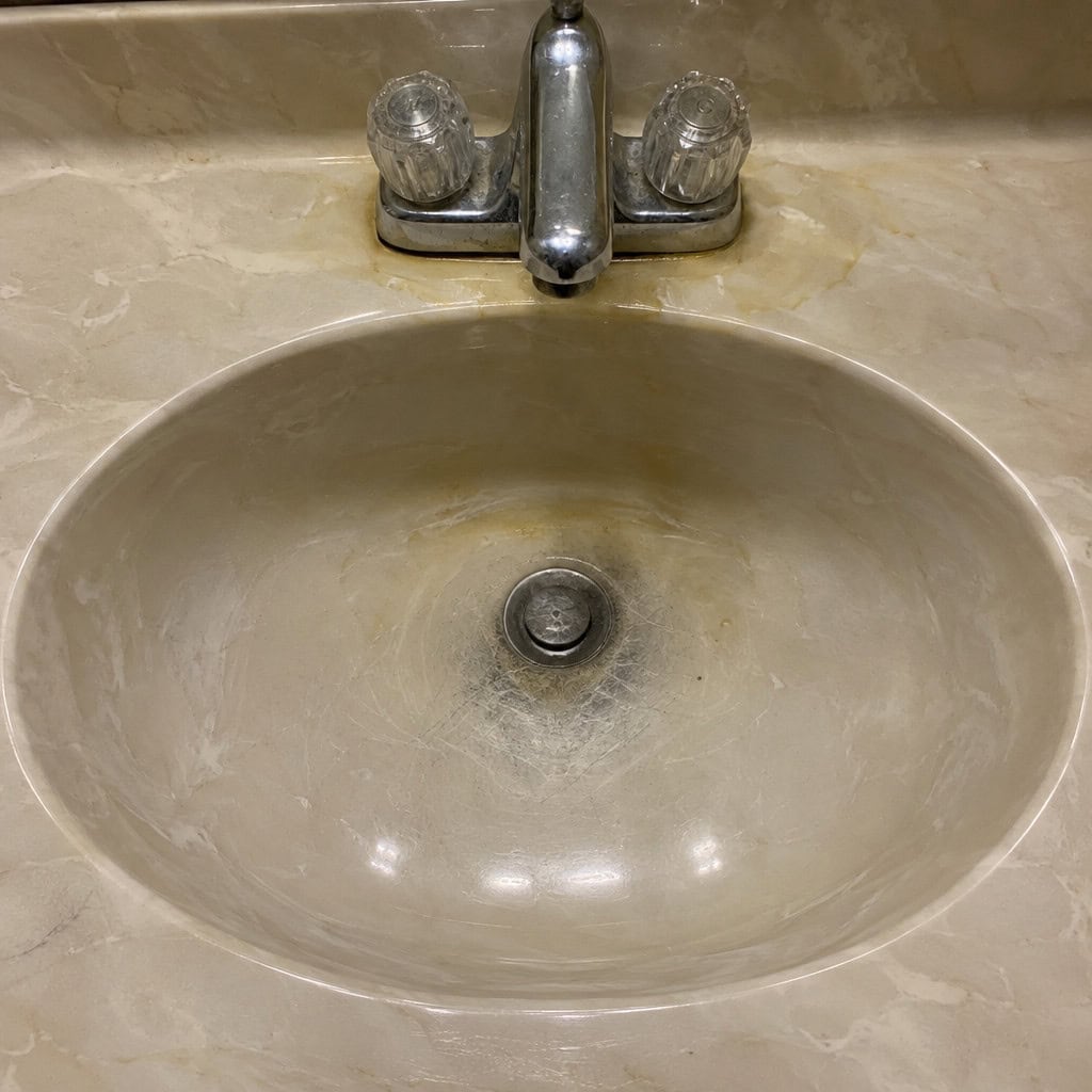 A One-Piece Cultured Marble Top With the Bowl Molded In