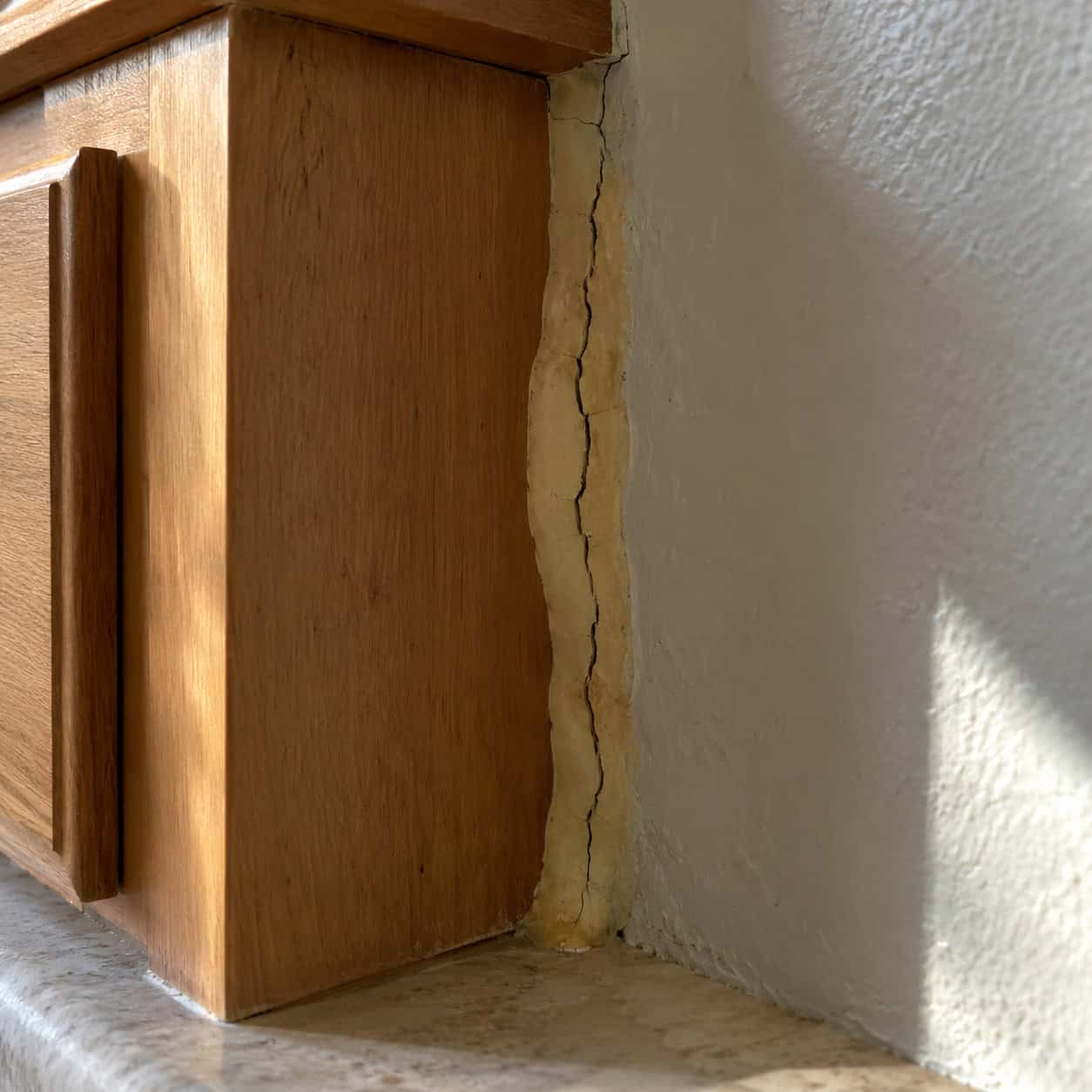 Caulk doing a filler strip's job