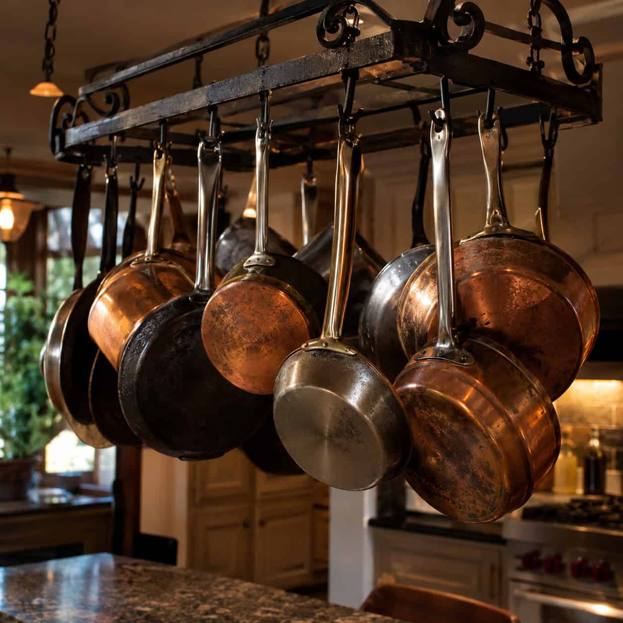 A Hanging Pot Rack Over the Island