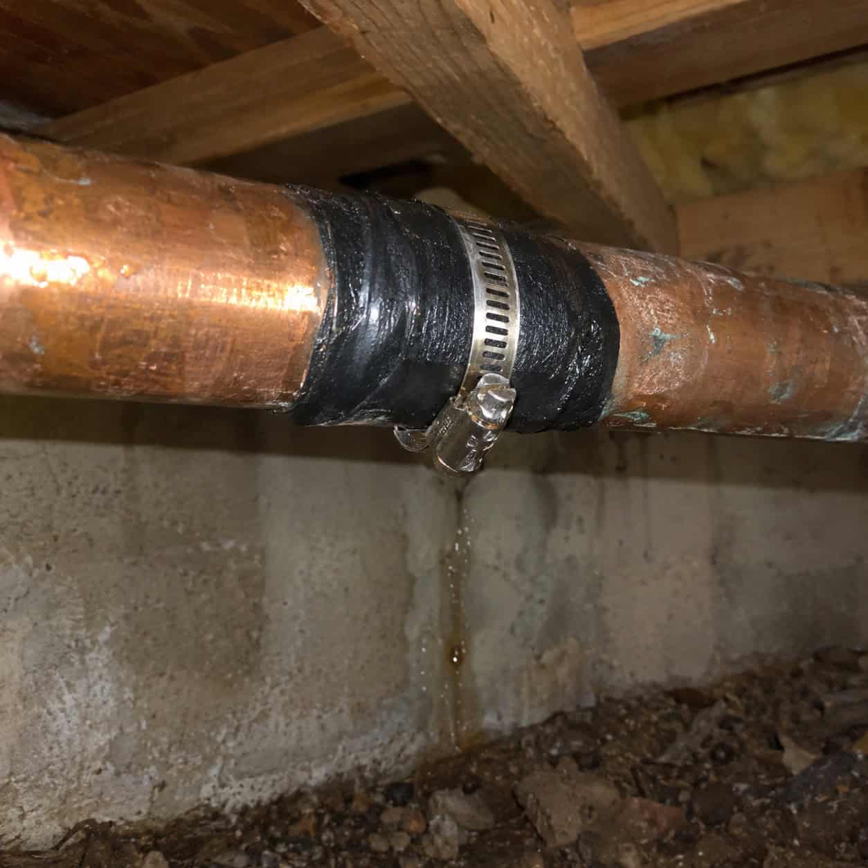 Patch a Leaking Pipe With Tape and a Hose Clamp and Call It Done