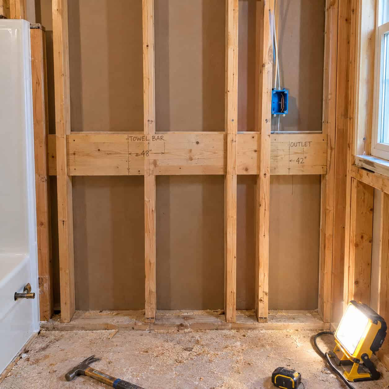 Towel bars, hooks, and outlets placed last